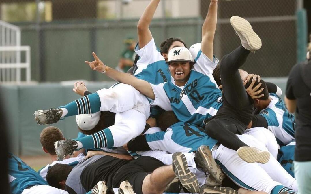 Archbishop McCarthy Mavericks celebrate on the pitchers mound after defeating Jesuit High Tigers 5-1in Class 6A State Baseball Championship at Centurylink Sports Complex - Hammond Stadium in Fort Myers on Sat., June 3, 2017.