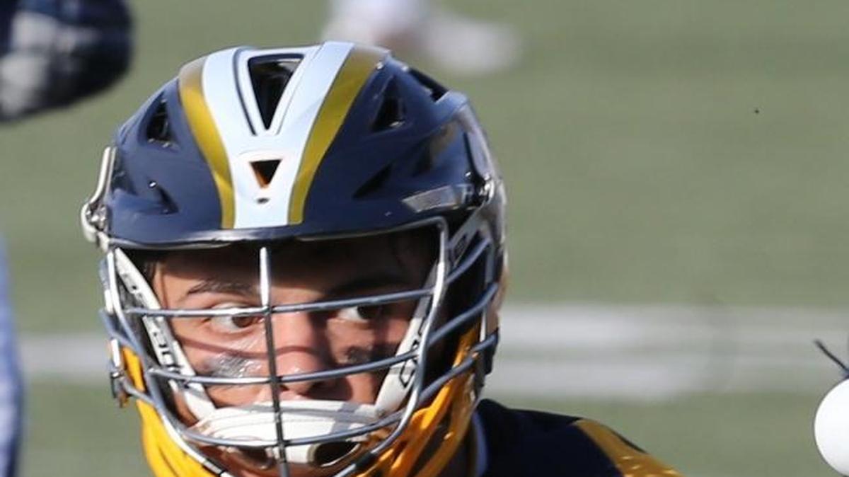 Belen Jesuit Prep’s Nico Perez-Blanco (17) watches the ball as the team plays Gulliver Prep in the FHSAA Lacrosse Playoffs at Gulliver Prep in Miami on April 18, 2017.