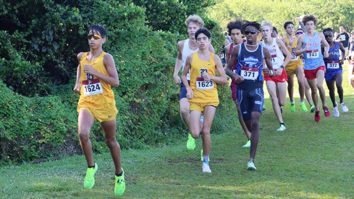 Led by region champ Joshua Ruiz and teammate Evan Torres, the Belen Jesuit boys’ cross-country team won the region title, the 26th in program history.
