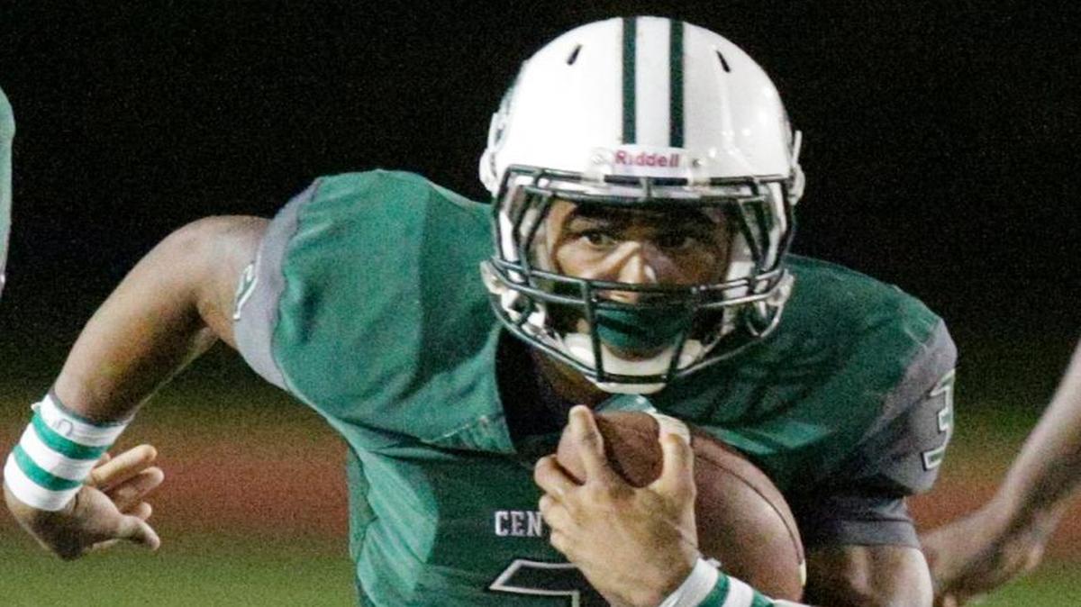 Miami Central’s Kenio Mike (3) runs with the ball during the football game against Northwestern on Saturday, October 17, 2015 at Traz Powell Stadium in Miami.