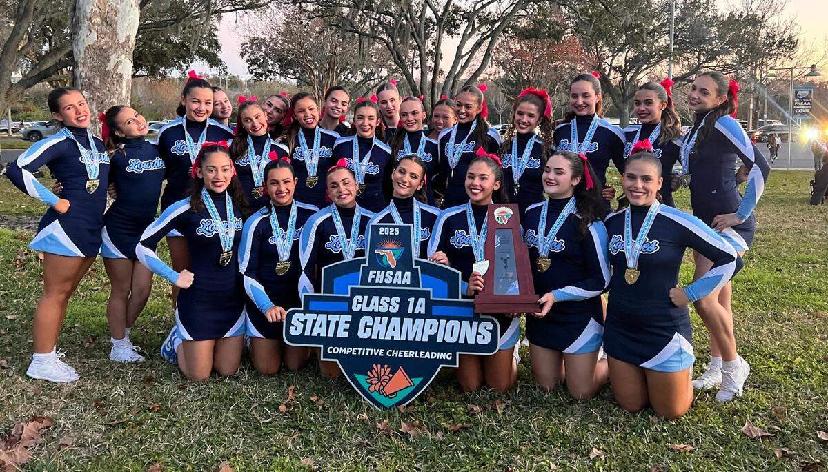 The state champion Lourdes competitive cheerleading team.