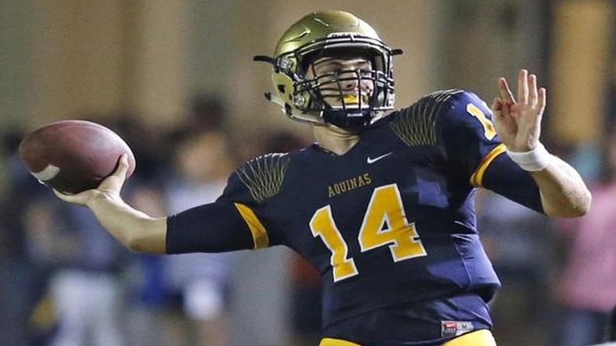 
Jake Allen sets up to pass as St. Thomas Aquinas hosts Booker T. Washington on Friday, August 28, 2015.
