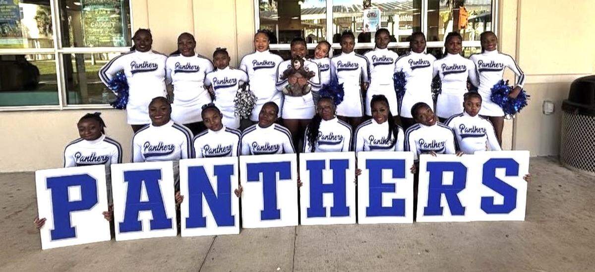 The state finalist and region champion Dillard competitive cheerleading team.
