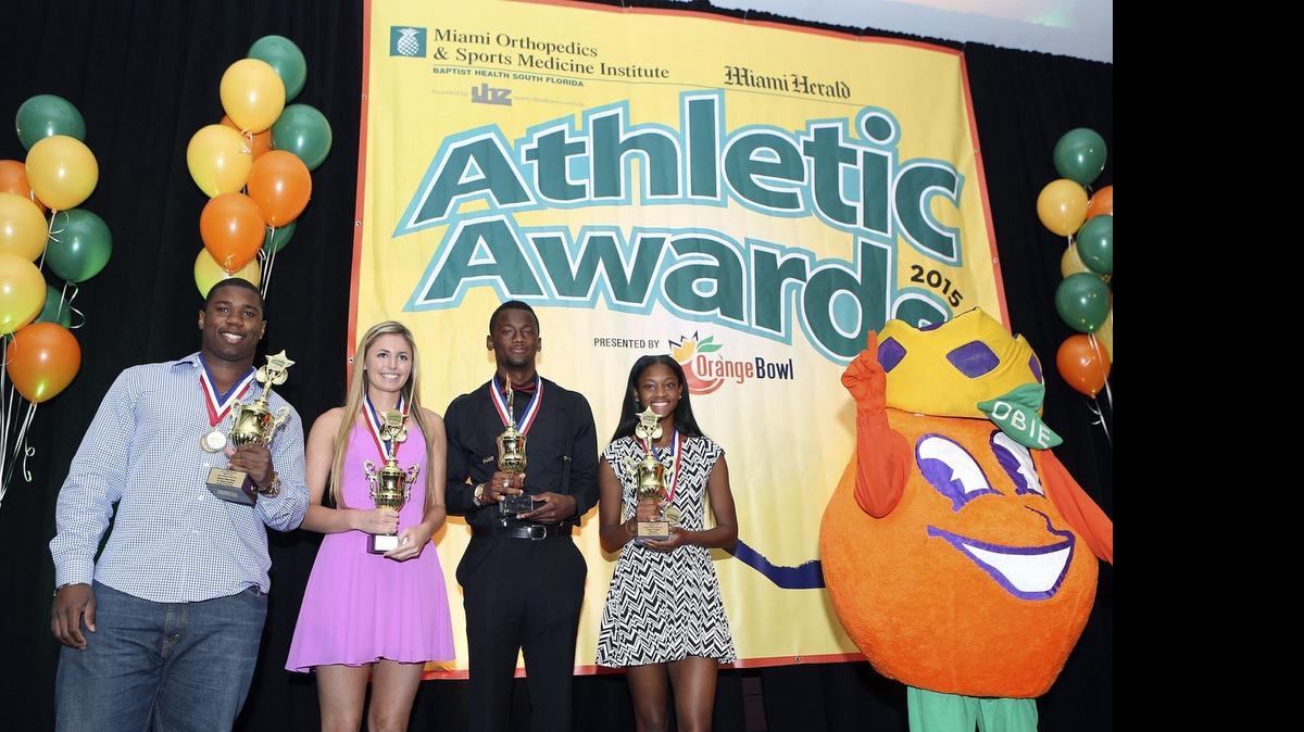 
Athlete of the Year winners (from left) Richerd Desir-Jones (St. Thomas Aquinas, Class 8A-6A), Nikki Lyons (St. Thomas Aquinas, Class 8A-6A), Torrance Gibson (American Heritage, Class 5A-1A), and Kimani Rushing (Hallandale, Class 5A-1A) pose during the Miami Herald's annual All-Broward Awards breakfast Friday, May 22, 2015 at the Signature Grand in Davie.
