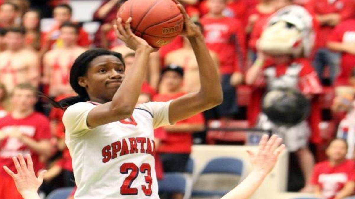 
Michelle Berry, shown during a game last season, led Miami Country Day with 21 points as the Spartans defeated West Palm Beach Oxbridge Academy 68-48 in the Region 4-3A final on Friday, Feb. 13, 2015. 
