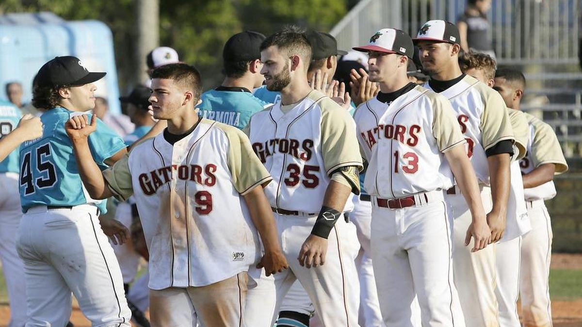 Barbara Goleman Gator baseball players shake hands with players from Archbishop McCarthy after the Mavericks won the Region 4-6A game 11-1 in six innings on Wednesday at Florida Memorial University.