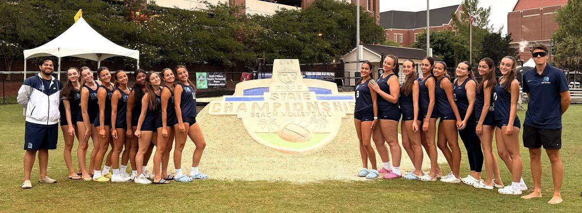 The state semifinalist and region champion Lourdes beach volleyball team.