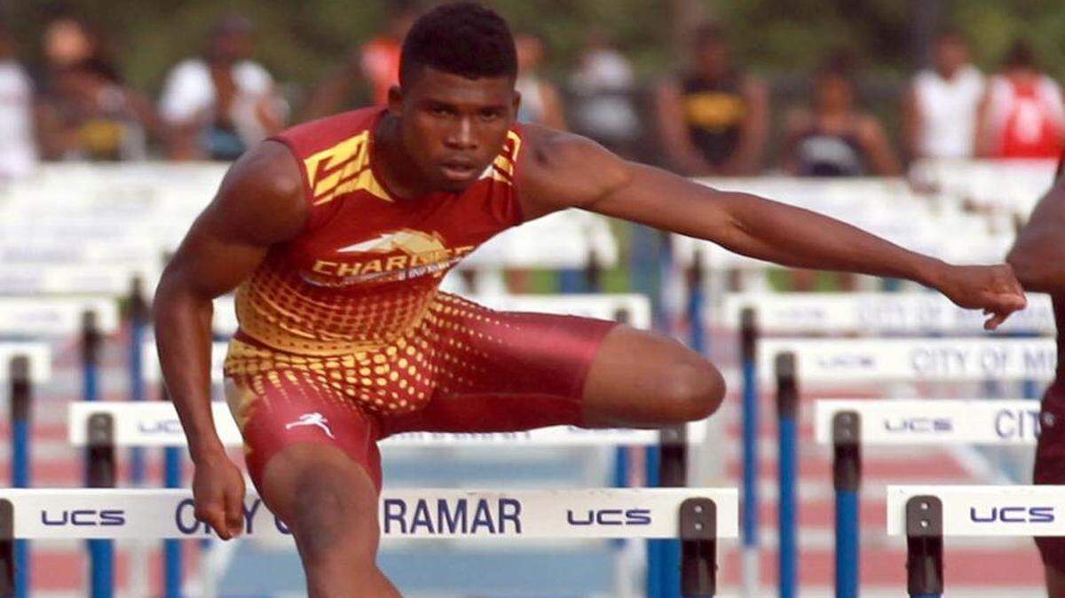 
Antwuan Musgrove of Hallandale High won the boys’ 100 hurdles at the Region 4-2A high school track championships Wednesday, April 22, 2015 at Ansin Sports Complex in Miramar. 

