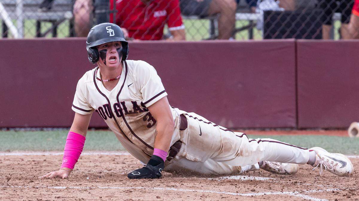 Marjory Stoneman Douglas Eagles’ Devin Fitz-Gerald (3) scores at home plate after Eagles’ Niko Benestad (6) hit a single against the West Broward Bobcats’ in the third inning of their Region 4-7A baseball final at Anthony Rizzo Field on Monday, May 13, 2024, in Parkland, Fla.