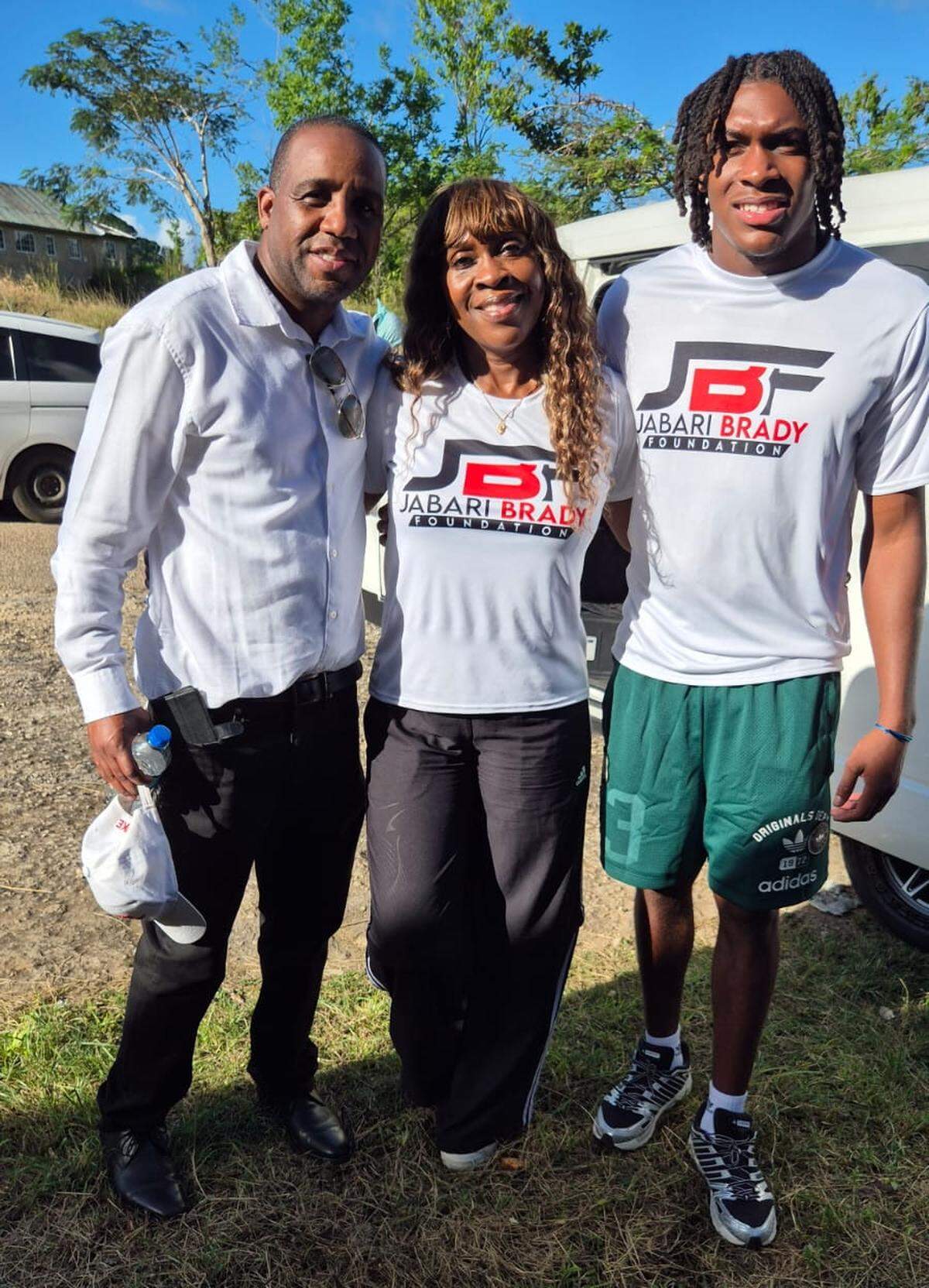Pictured with Jabari Brady (right) includes his mom, Nadine (middle).