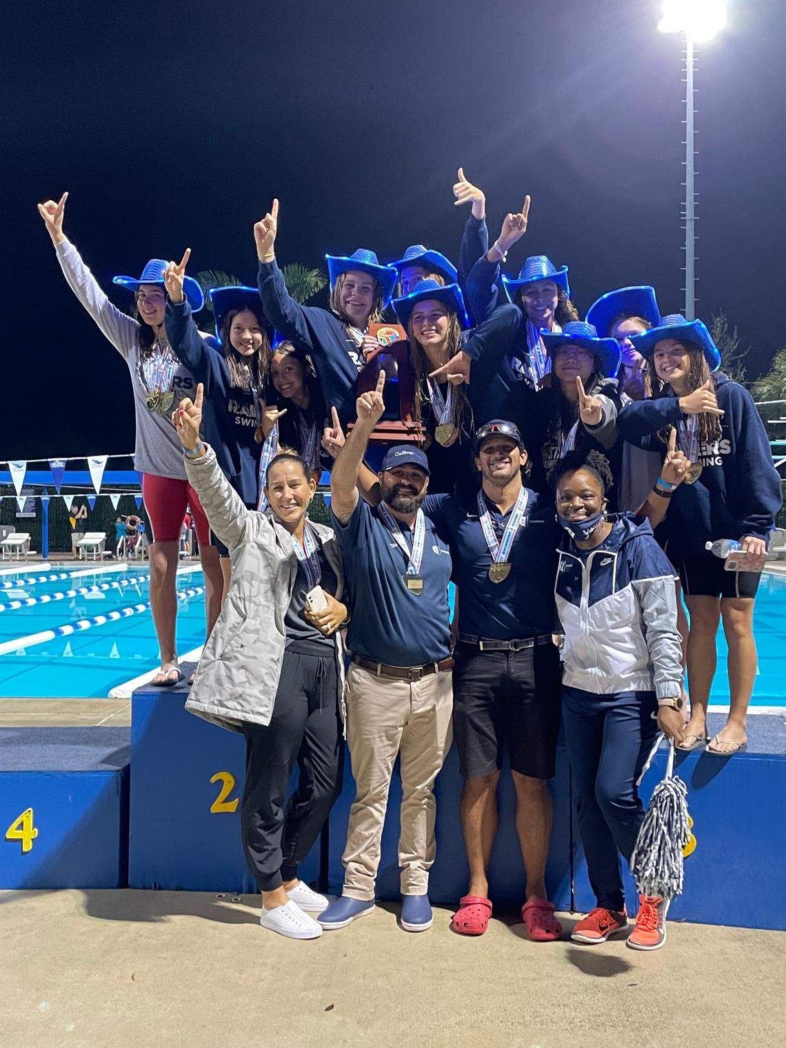 The state champion Gulliver Prep girls’ swim team.