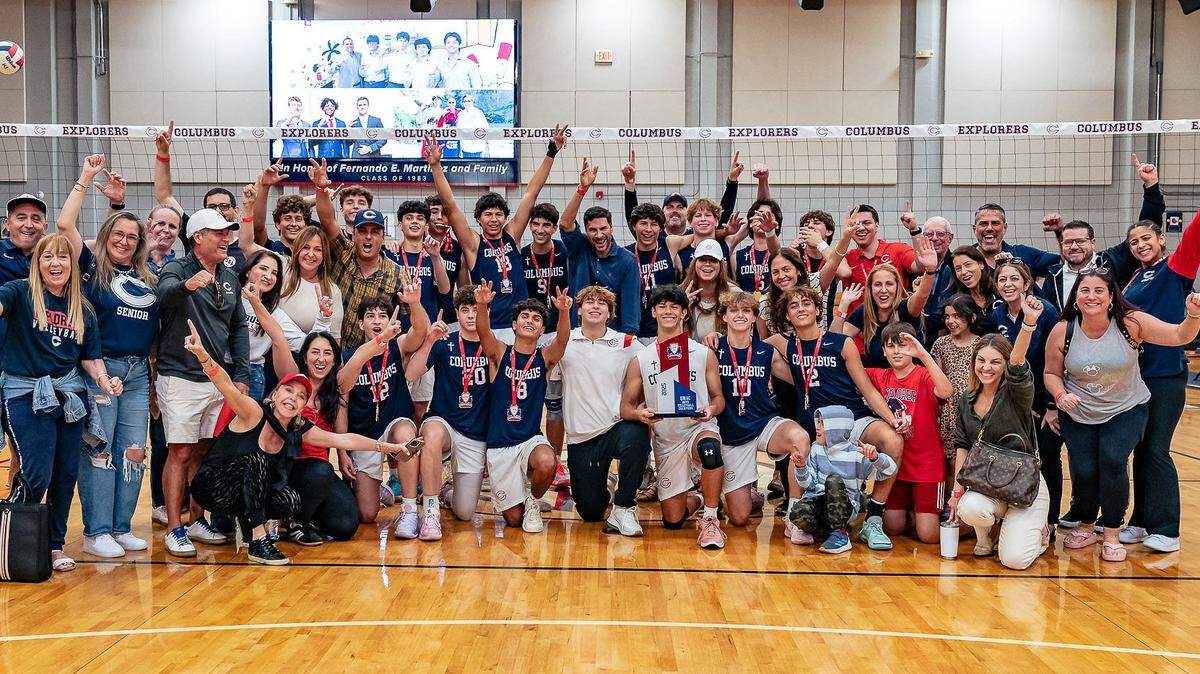 The GMAC Champion Columbus boys’ volleyball team with family and friends.