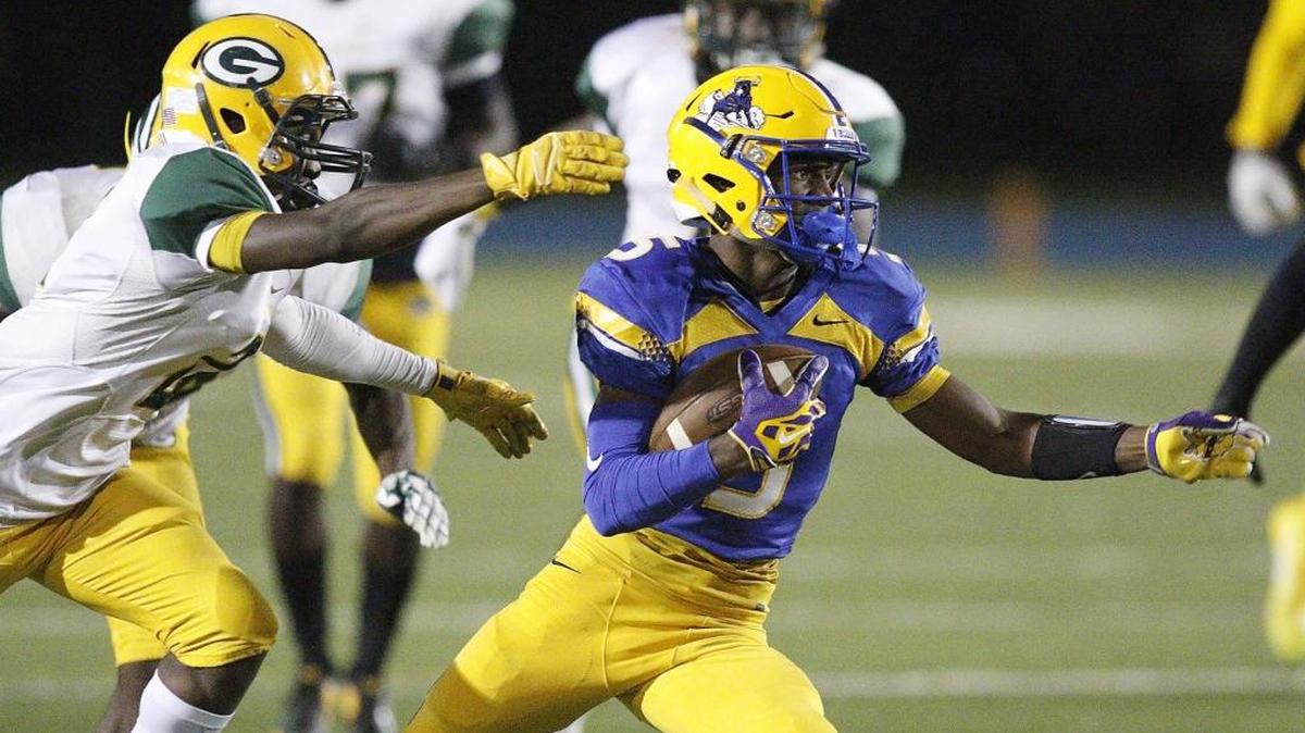 Northwestern Bulls Chatarius Atwell (5) carries the ball against Miami Jackson Generals during the annual Soul Bowl football game on Friday, Nov 3, 2017 at Traz Powell Stadium in Miami.