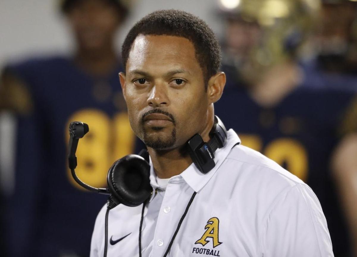 Aquinas head coach Roger Harriott is pictured on the sidelines as St. Thomas Aquinas plays Tampa Plant for a state football title in Orlando on December 9, 2016.