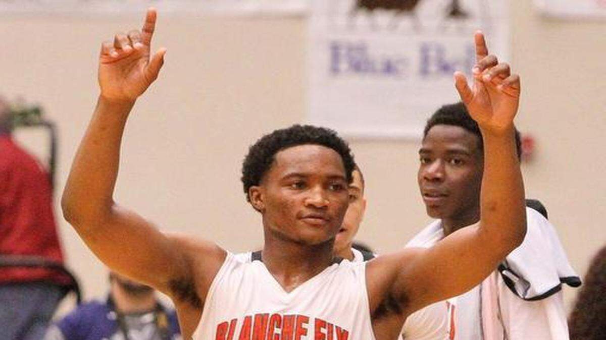 
Blanche Ely’s Laquincy Rideau celebrates after a victory over North Port in a Class 7A boys’ basketball semifinal Friday, Feb. 27, 2015 in Lakeland, Fla. Ely won 91-59 and will play for the state title Saturday. 
