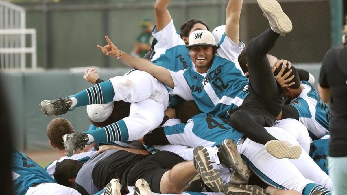 Archbishop McCarthy Mavericks celebrate on the pitchers mound after defeating Jesuit High Tigers 5-1 in Class 6A State Baseball Championship at Centurylink Sports Complex - Hammond Stadium in Fort Myers on Saturday, June 3, 2017.