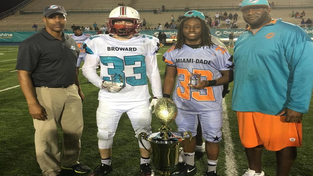 Stoneman Douglas' Daniel Crescitelli, left, and Miami Central's Kord Jenkins were named Defensive and Offensive Most Valuable Players, respectively, at the Miami Dolphins Dade-Broward All-Star Game Friday night at Traz Powell Stadium.