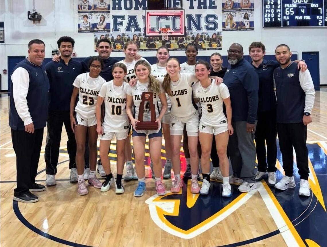 The district champion Palmer Trinity girls’ basketballl team.