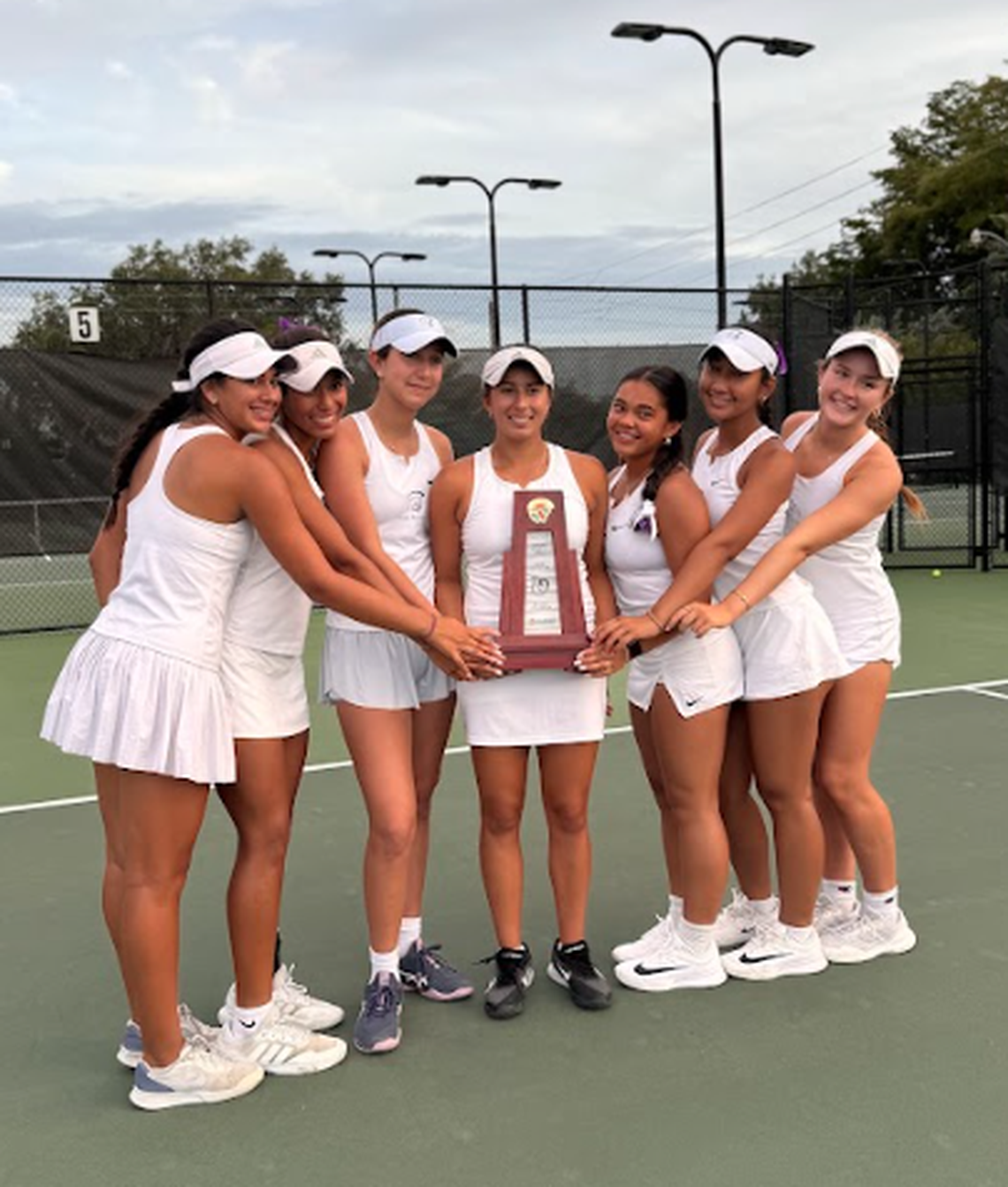 The region champion True North girls’ tennis team.