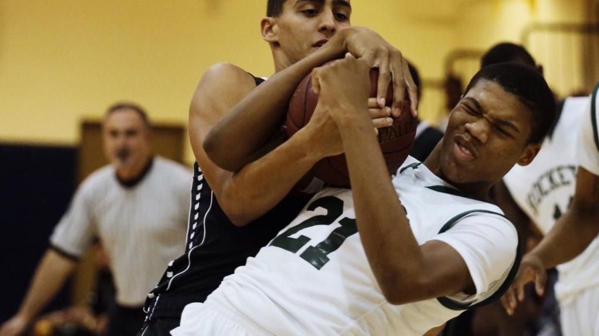 Miami Central’s Anthony Wilson, right, shown during a game last season against Miami Beach, helped lead the Rockets past South Miami in a GMAC semifinal Wednesday, Jan. 27, 2016.