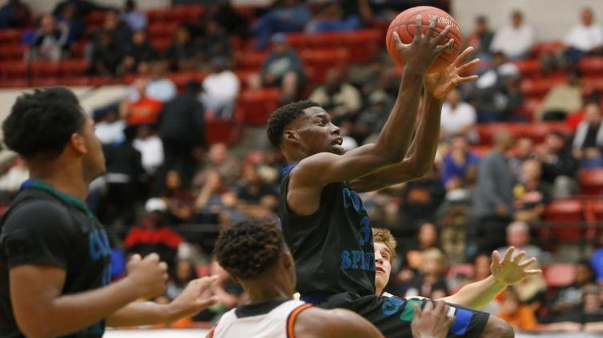 Coral Springs’ Malik Foy attemps a shot during a boys’ basketball Class 8A semifinal game against Winter Park at The Lakeland Center on Friday, Feb. 26, 2016.