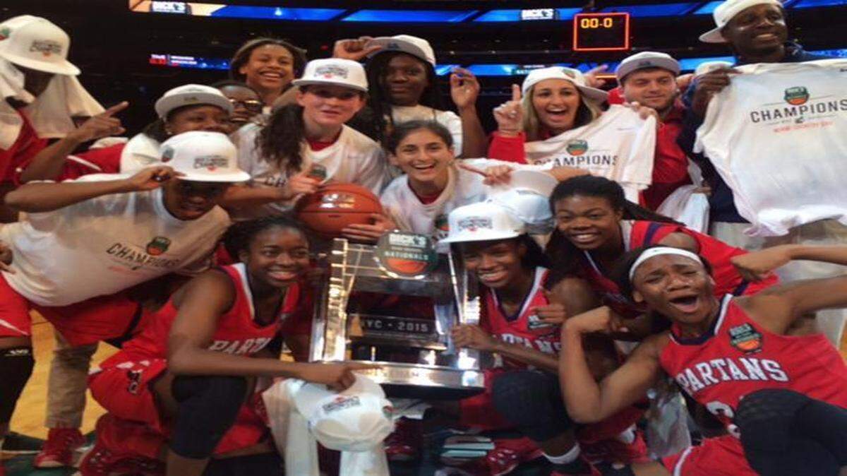 
Flexing their muscle: The Miami Country Day girls’ basketball team celebrates after beating Fort Lauderdale Dillard at Madison Square Garden.
