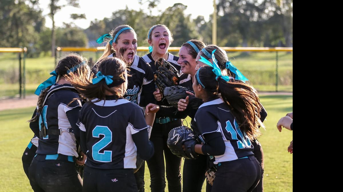 
Coral Reef players celebrate a 9-5 win against Douglas in a Class 8A state softball semifinal at Historic Dodgertown in Vero Beach on Friday, May 8, 2015.
