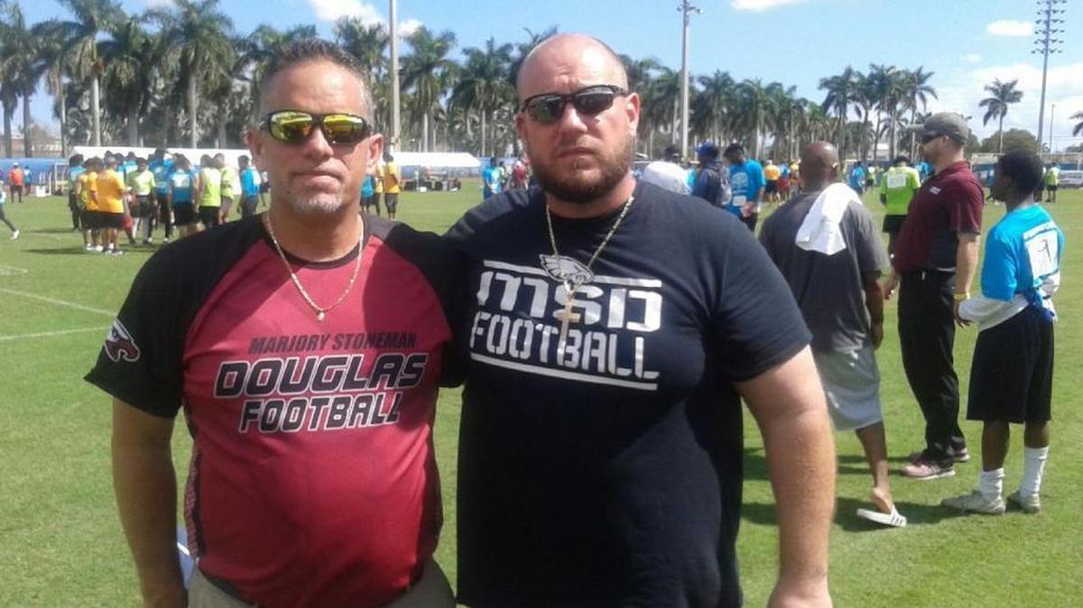 Head coach Willis May, left, and defensive coordinator Quentin Short.