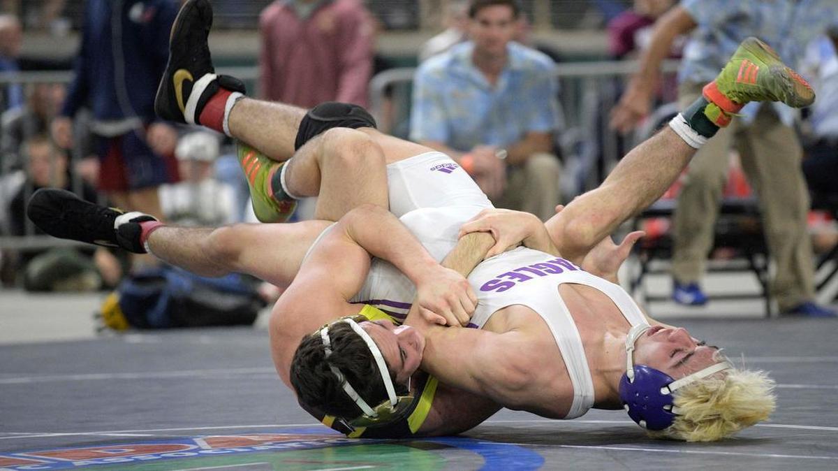 St. Thomas Aquinas Grant Aronoff, bottom, beat Southwest Miami’s Franco Valdes to win the Class 3A 138-pound division, Aronoff’s second state title.