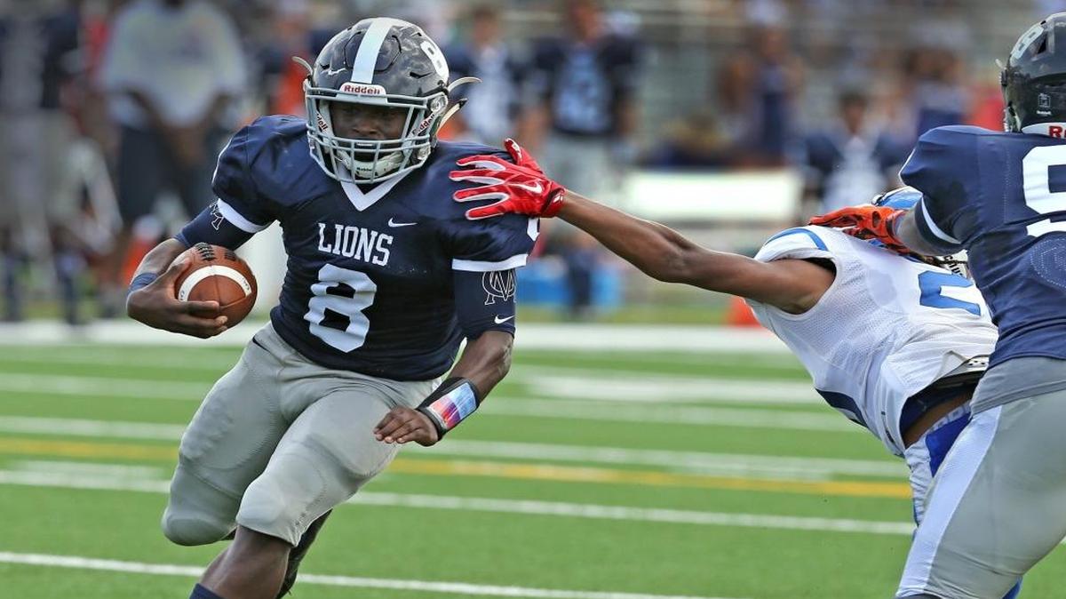Chaminade-Madonna HS Shaun Shivers, 8, runs for a second quarter touchdown as they play North Miami Beach HS at Chaminade-Madonna in Hollywood, Sept. 2, 2016.