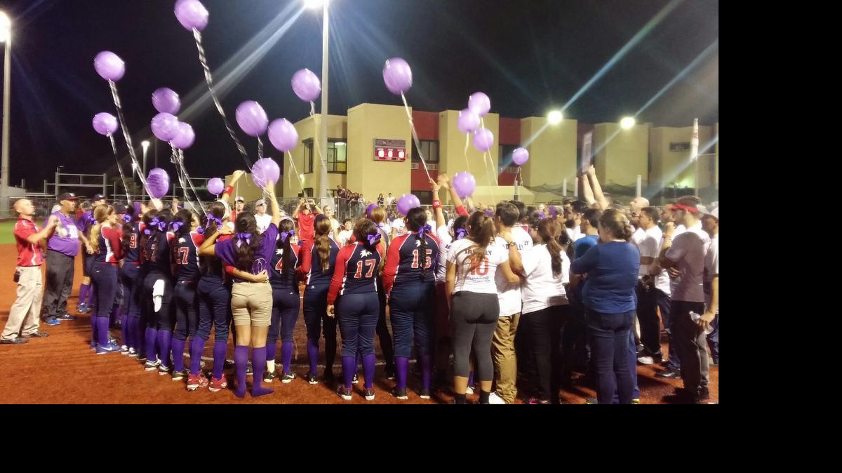 
 Purple balloons with messages to Janelly Rivalta from teammates are released. 

