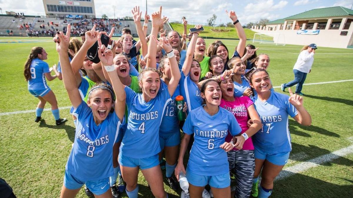 The Lourdes girls’ soccer team celebrates after beating Oviedo 1-0 in the 2018 Class 5A championship game at the Spec Martin Stadium in DeLand on Friday.