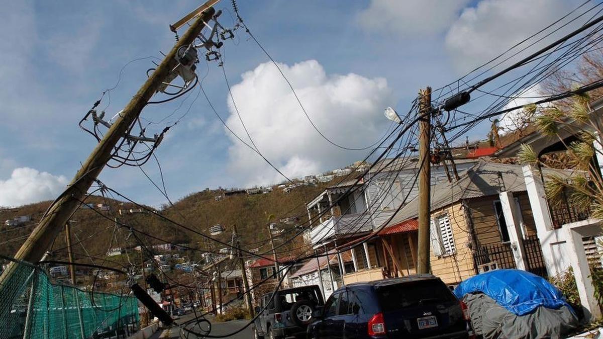 Coral Springs senior Chamoya Buchanan, who moved to Margate after Hurricane Irma tore through her family home in the U.S. Virgin Islands in September, made the Coral Springs soccer team. Above, damaged power lines are seen after the passage of Hurricane Irma in Charlotte Amalie, St. Thomas, U.S. Virgin Islands, on Sept. 10.