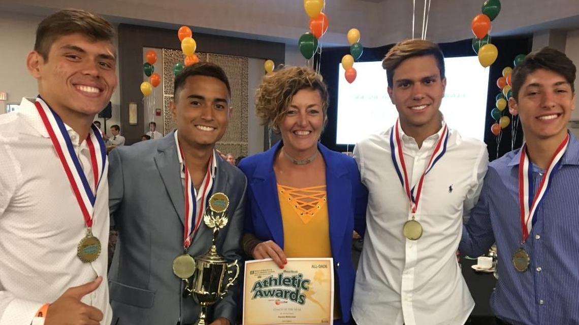Pamela McDonald, middle, is believed to be the only female head coach in Florida to lead a boys’ soccer team to the state tournament, finishing one win short of the title.
