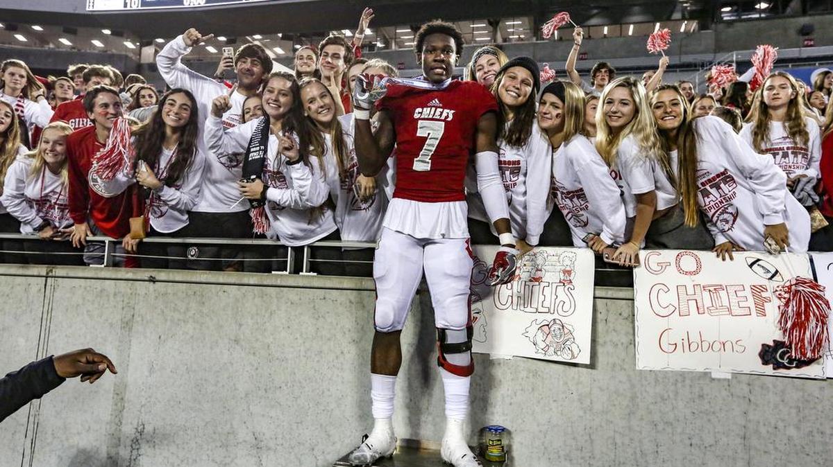 Cardinal Gibbons defensive end Khris Bogle (7) celebrates with fans after Gibbons defeats North Marion in the Florida High School Athletic Association State Championships Class 5A at Camping World Stadium in Orlando on Dec. 7. UM is hosting Bogle on a recruiting visit this weekend before National Signing Day on Wednesday.
