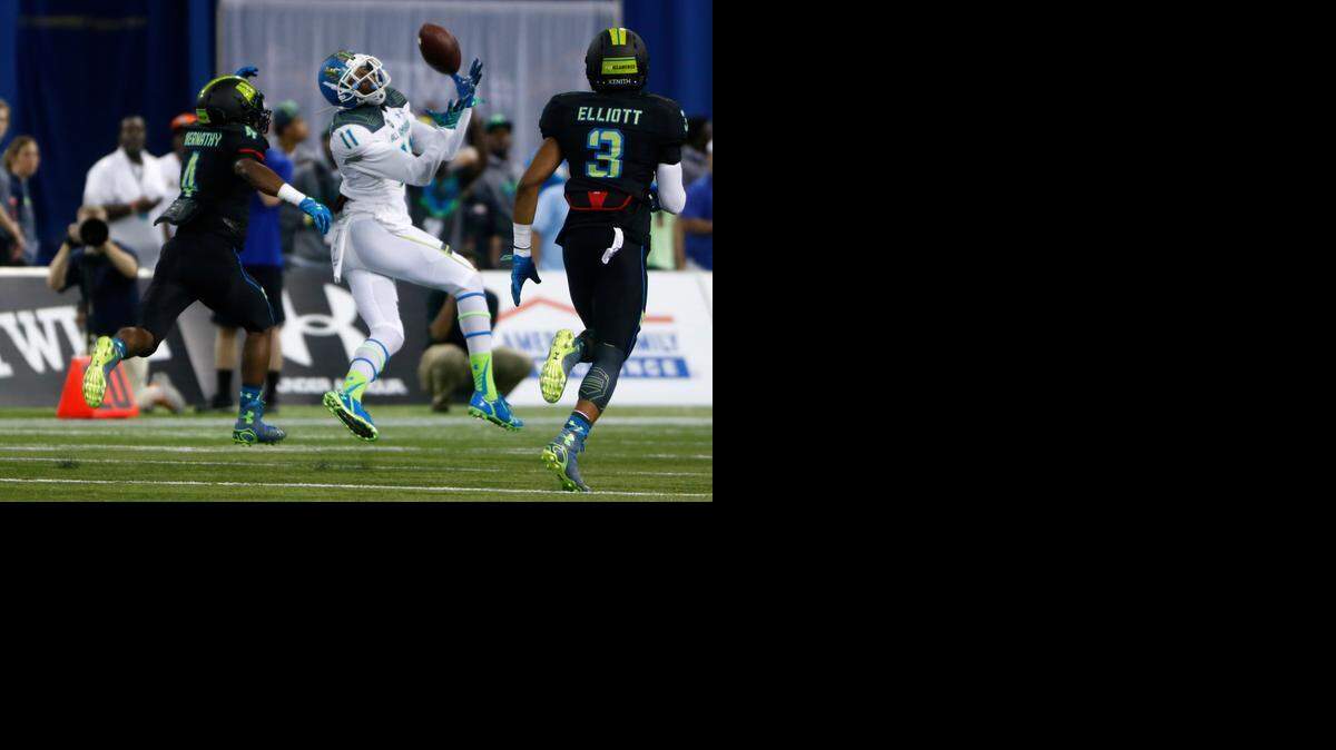 
George Campbell (11), from East Lake High School catches a pass during the first quarter of the Under Armour All-America High School Football Game at Tropicana Field in St. Petersburg on Jan. 2 2015.
