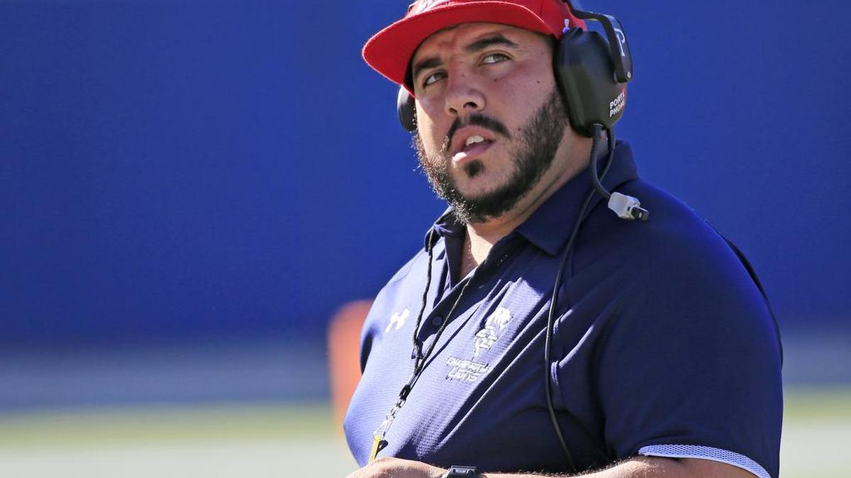 The Lions head coach Hector Clavijo, III looks on as Champagnat Lions play North Florida Christian Eagles in the Florida High School Athletic Association State Chapionships Class 2A at Camping World Stadium in Orlando on Friday, December 7, 2018.