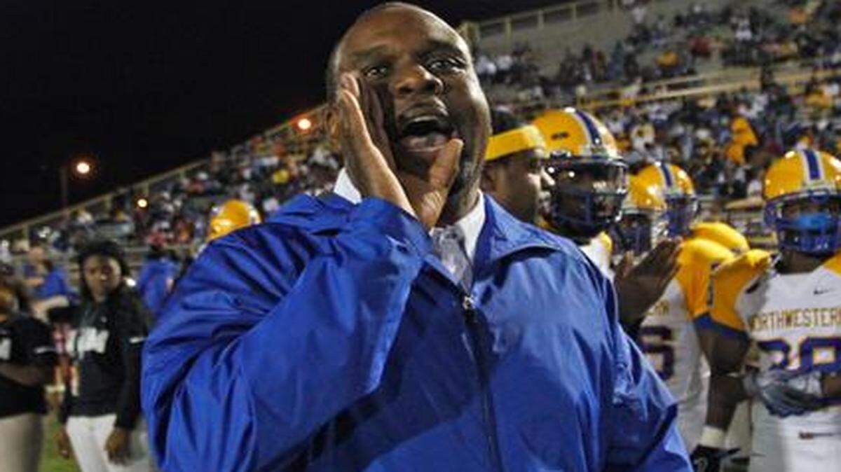 
Then-Northwestern coach Billy Rolle shouts instructions during a game against Jackson at Traz Powell Stadium on Friday, Nov. 12, 2010. 
