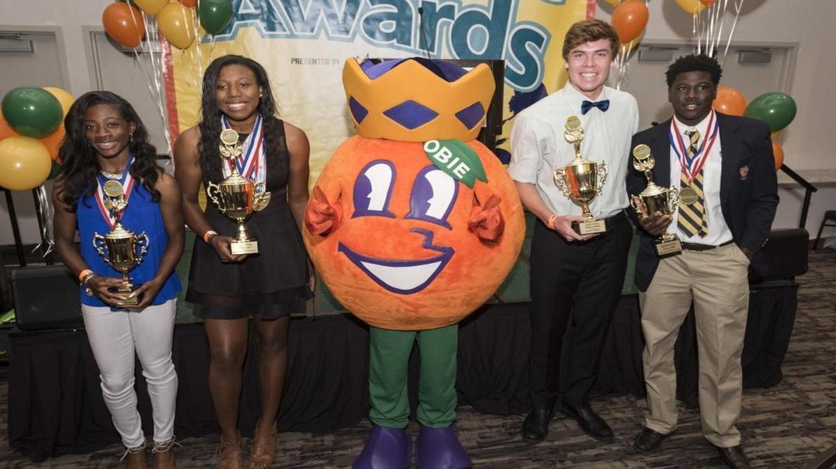 All-Dade athletes of the year, from left, Symone Mason of Southridge, Nikkia Benitez of Westminster Christian, Michael Colonna of Ransom Everglades and Don Chaney Jr. of Belen are honored at Jungle Island on Tuesday.