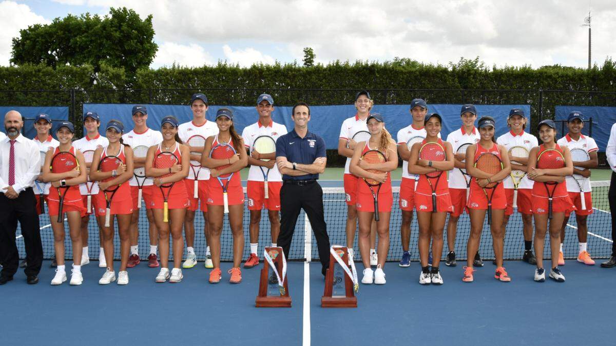 Award winning Doral Academy Coach Justin Puppo and his state champion boys’ and girls’ tennis teams.