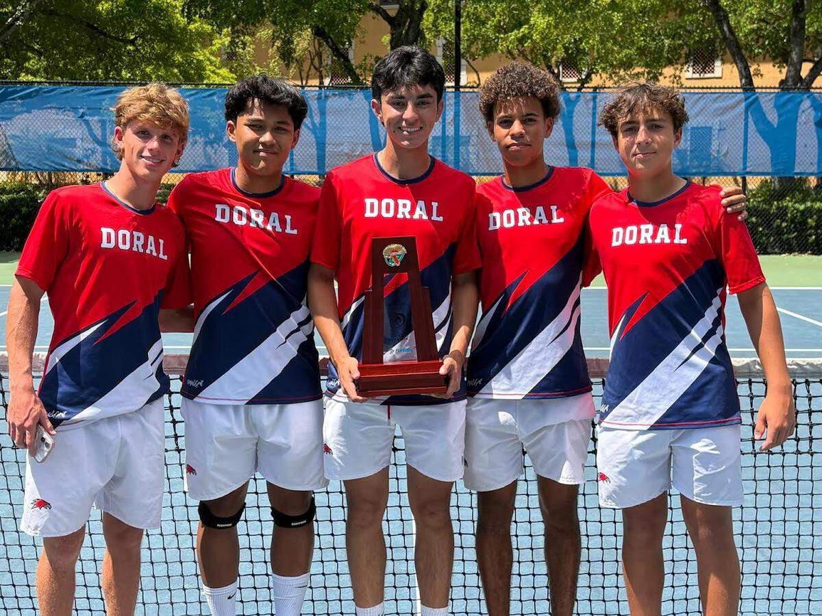 The region champion Doral Academy boys’ tennis team.