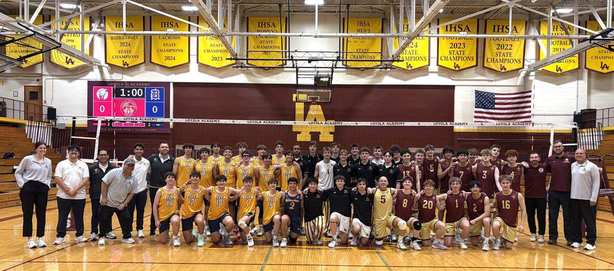 The Belen Jesuit boys’ volleyball team with boys’ volleyball teams from St. Ignatius and Loyola Academy in Chicago.