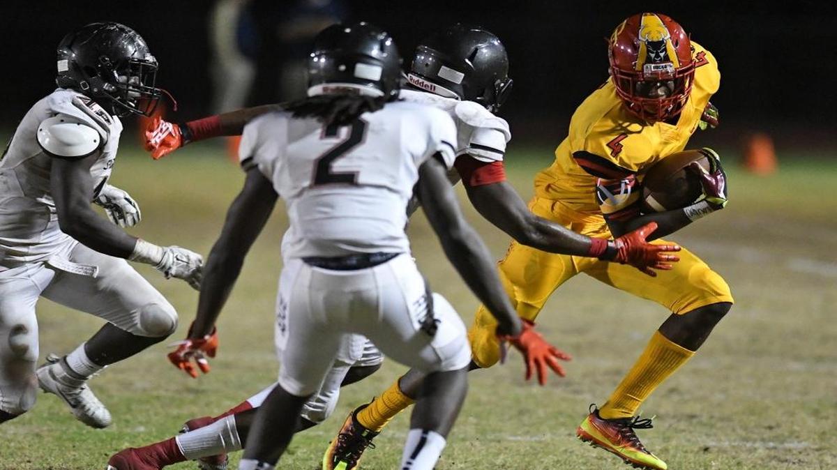 Jerry Jeudy of DBHS breaks free for a few yards. Deerfield Beach High vs. Miami Southridge. Class 8A Semifinal. Deerfield Beach High Stadium, Deerfield Beach, FL. on Fri., Dec. 2, 2016.