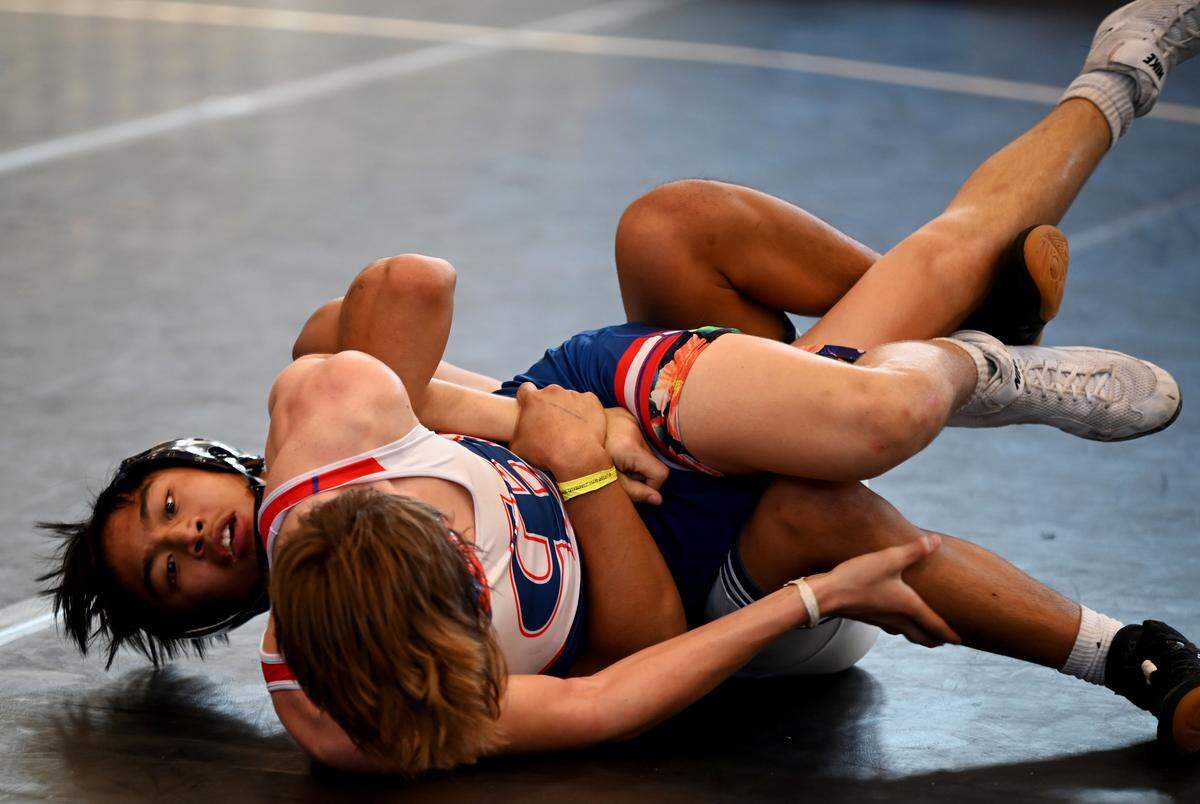 Mater Lakes Keagan Mesina works his way to a pin against Christian Day from Cocoa Beach during the 1A final at the FHSAA Duals state tournament on Saturday at Osceola High School in Kissimmee.