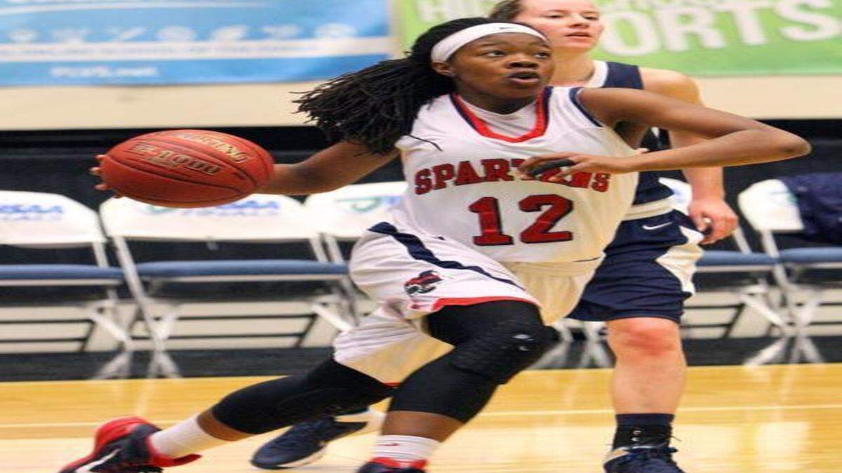 
Miami Country Day’s Kelsey Marshall heads for the basket against Calvary Christian during the first half of the FHSAA Girls’ 3A Basketball semifinals at The Lakeland Center on Tuesday, Feb. 17, 2015 in Lakeland, Fla. 
