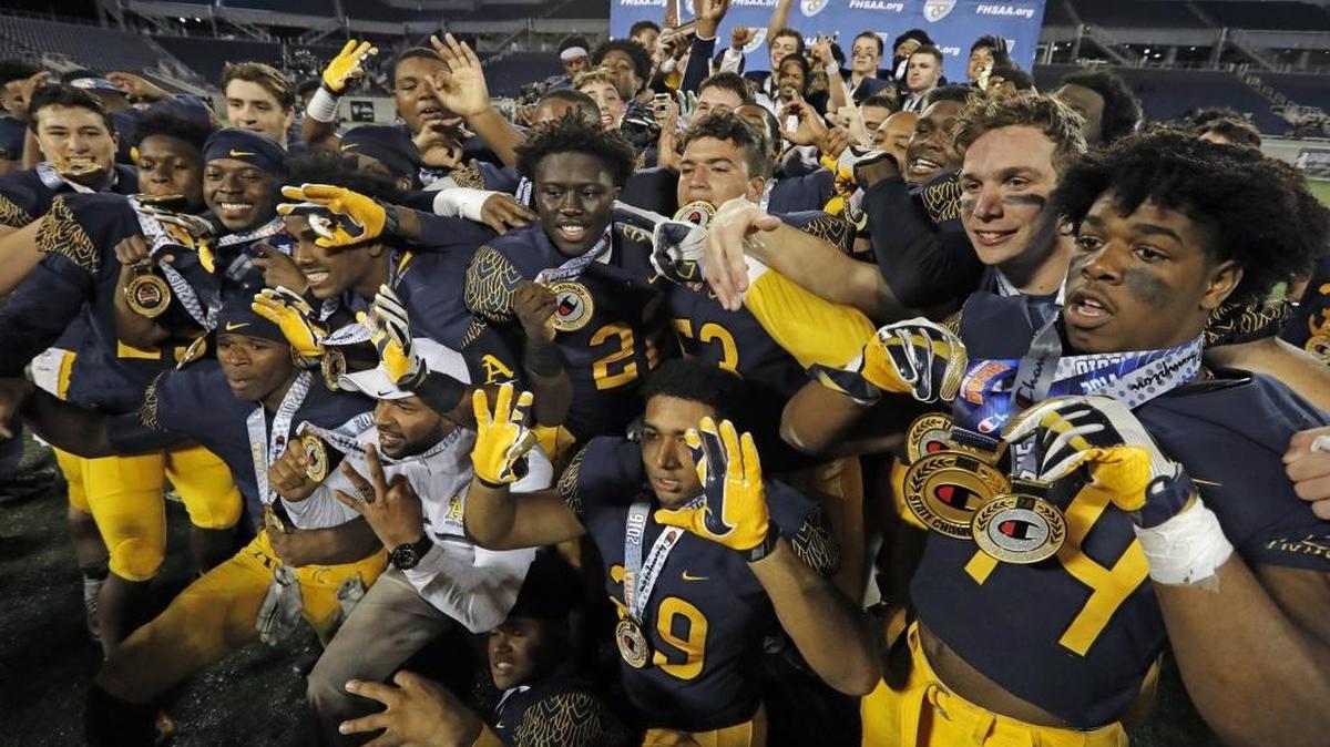 St. Thomas Aquinas defeats Tampa Plant 45-6 for a Broward record third consecutive state football title in Orlando on December 9, 2016.