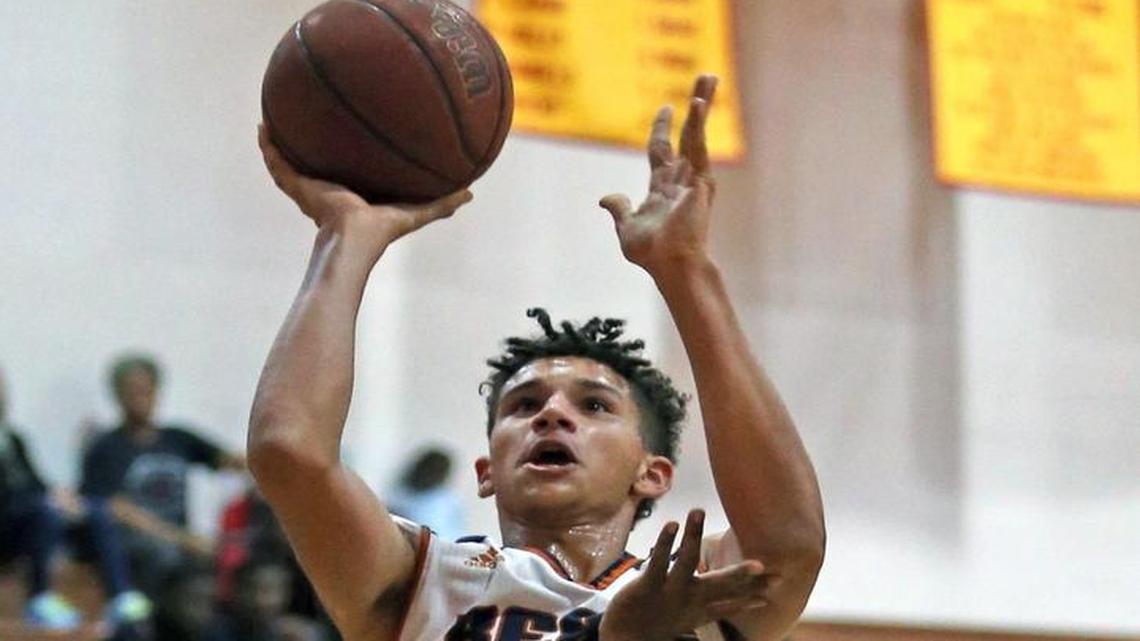 Mater Lakes' Alex Cuevas drives to the basket against Monsignor Pace during Wednesday night’s game.