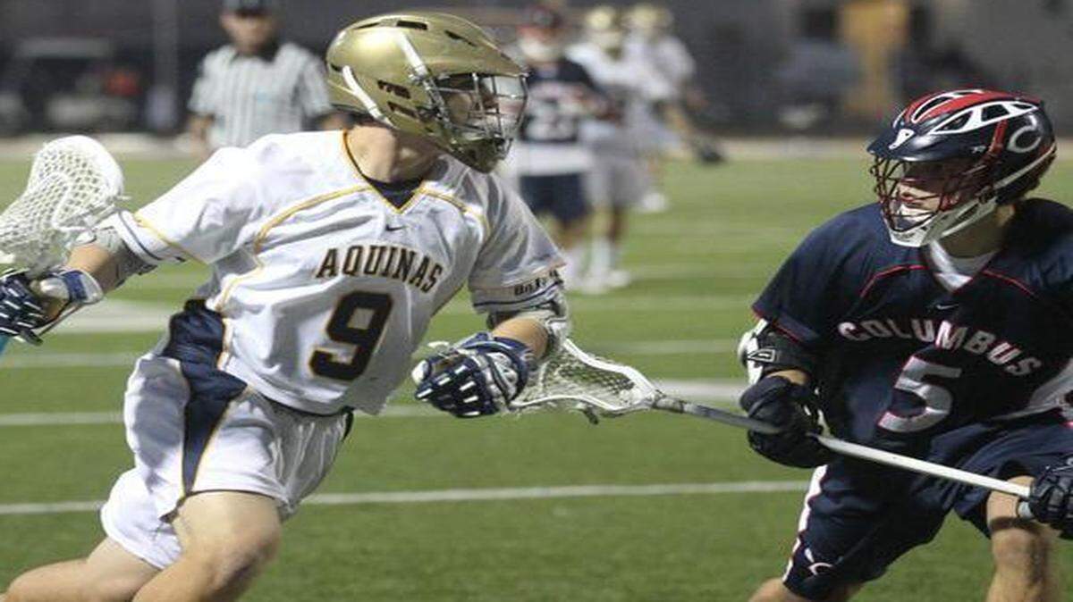 
St. Thomas Aquinas’ Kevin Koss looks for an opening during last year’s playoffs.
