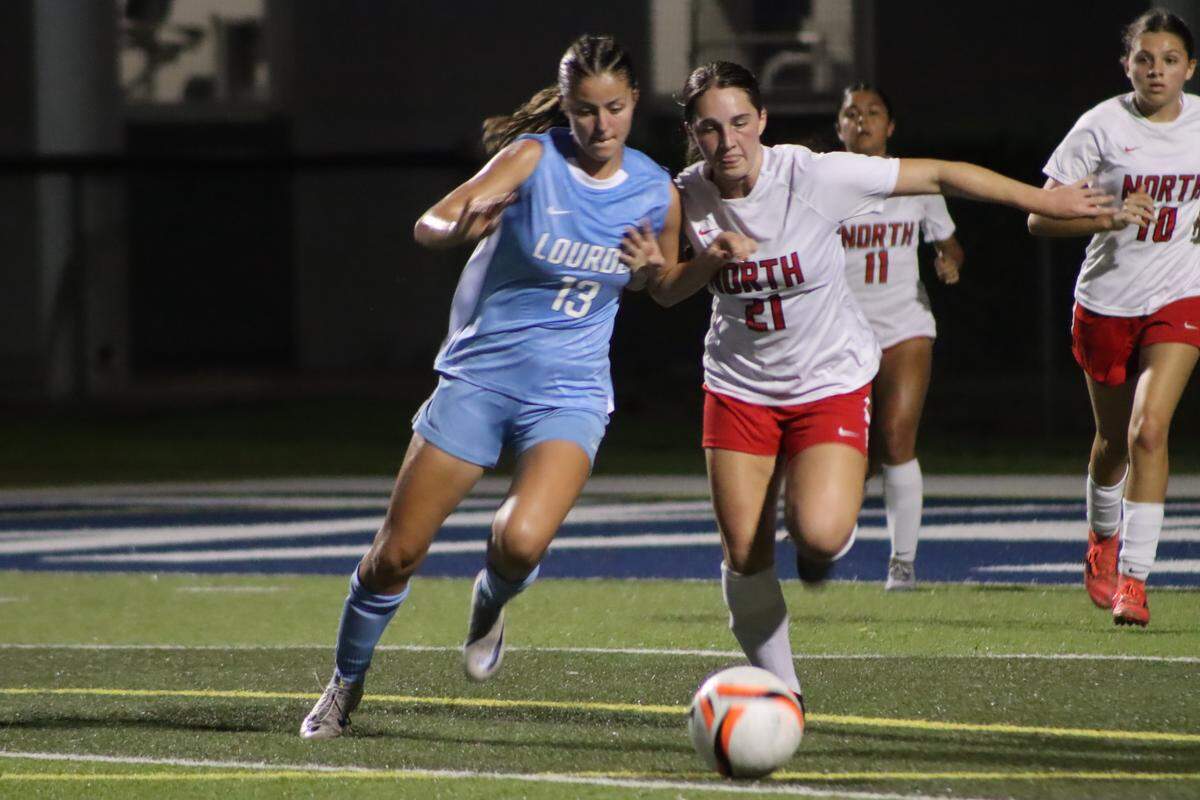 The Lourdes Academy girls’ soccer team against North Fort Myers.