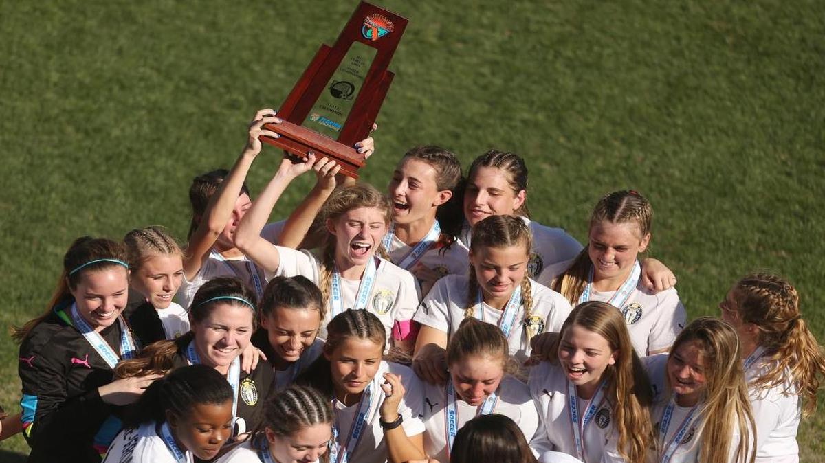 Aquinas players celebrates after winning the 4A Girls FHSAA State Soccer Championship game of Creekside vs. St. Thomas Aquinas at Spec Martin Stadium in DeLand on Fri., Feb. 17, 2017. Aquinas won the game 2-0.